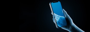 A neon blue and transparent phone being held in a neon blue hand