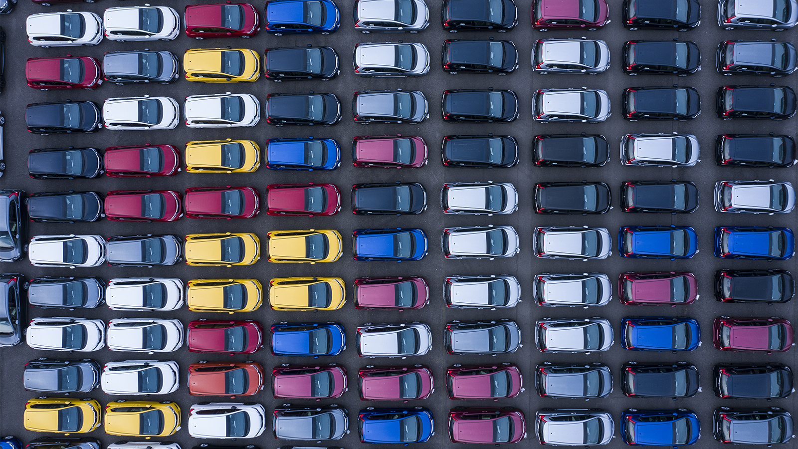Aerial view of cars lined up 